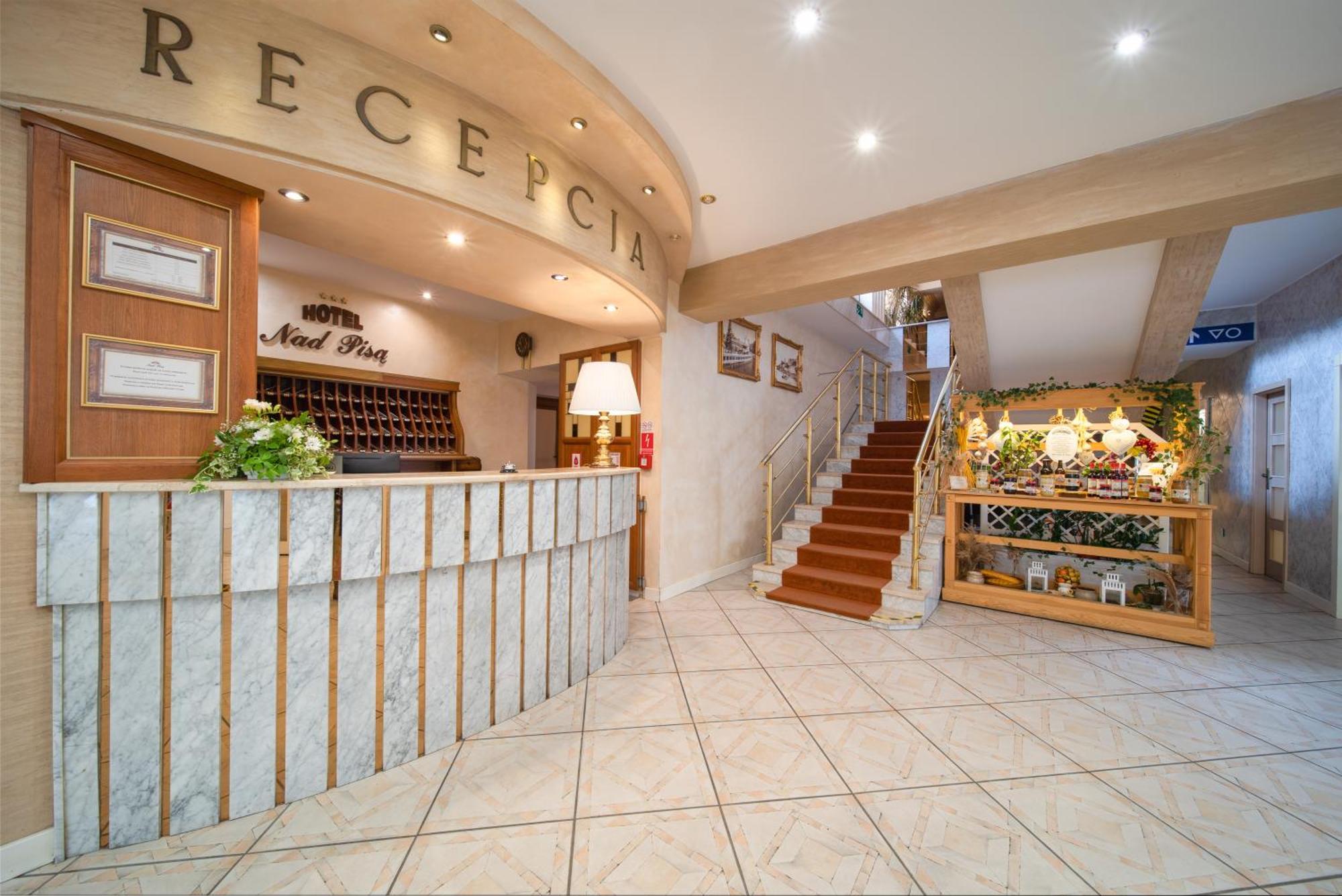 Hotel Nad Pisa Pisz Bagian luar foto
