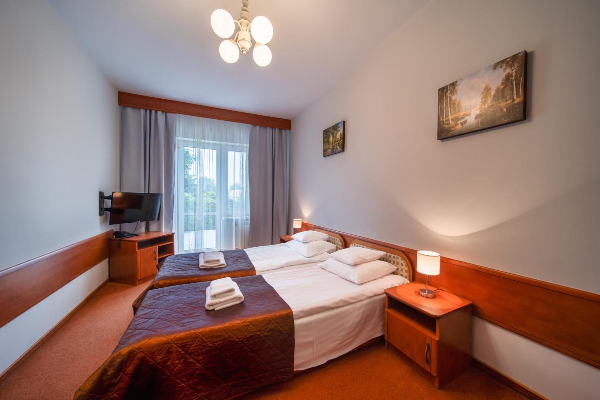 Hotel Nad Pisa Pisz Bagian luar foto